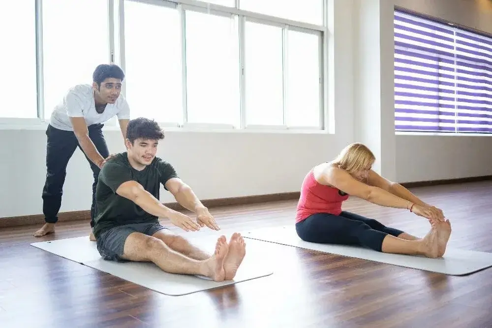 Student in a challenging advanced yoga pose.