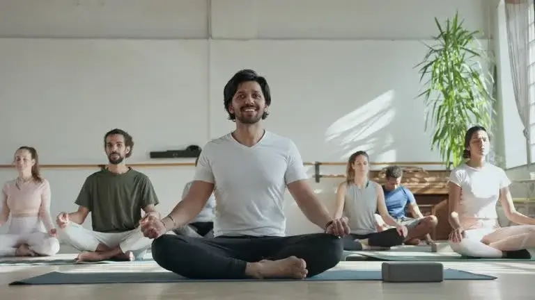 Candid shot of students laughing after a class.