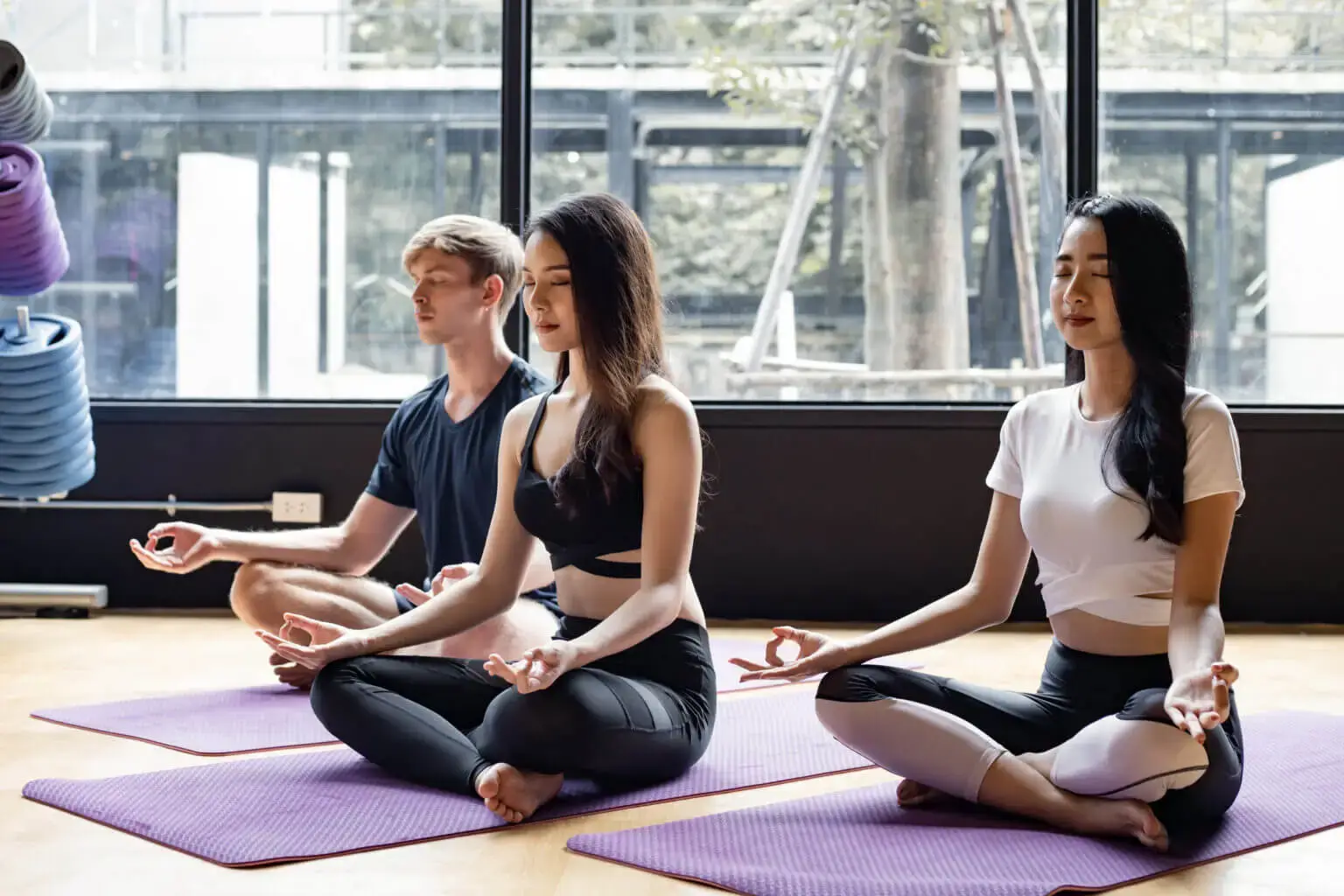 Bright and airy yoga studio space.